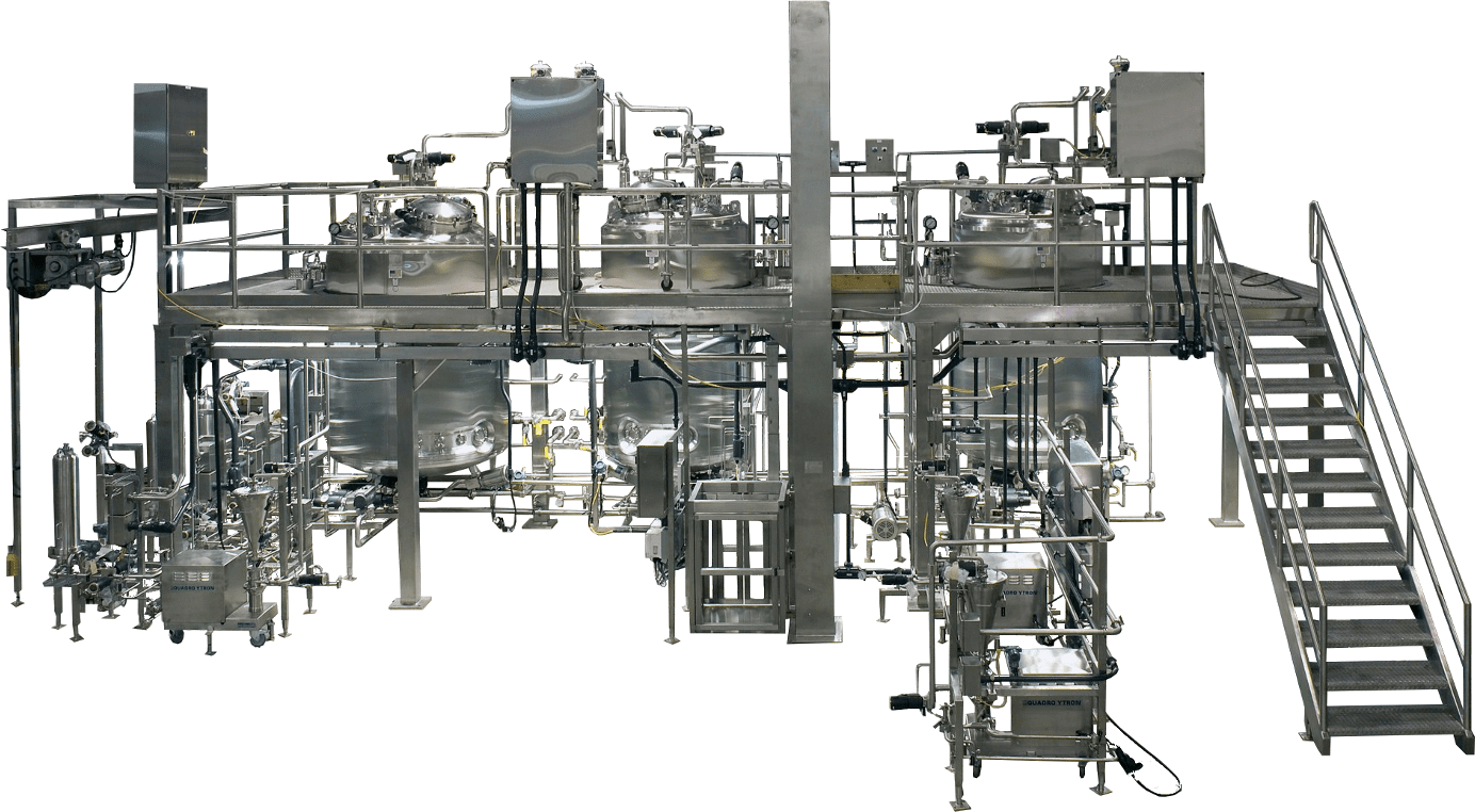 A large industrial machine with many pipes and valves.